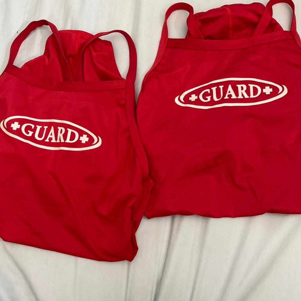 2 red One piece lifeguard suits